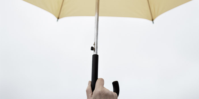 Holding an umbrella | Atradius 